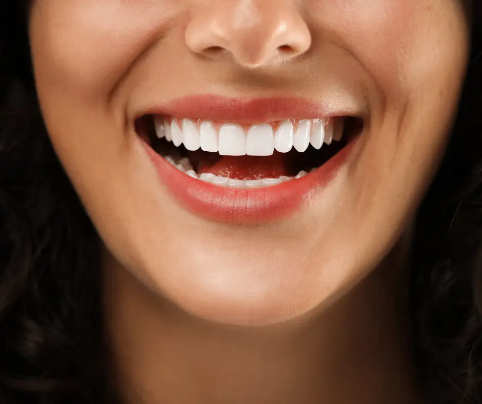 Woman with new veneers smiling